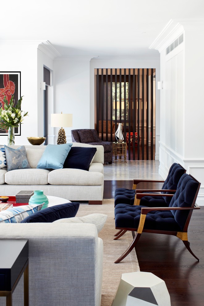 Photo of a contemporary formal open concept living room in Sydney with white walls, dark hardwood floors and brown floor.