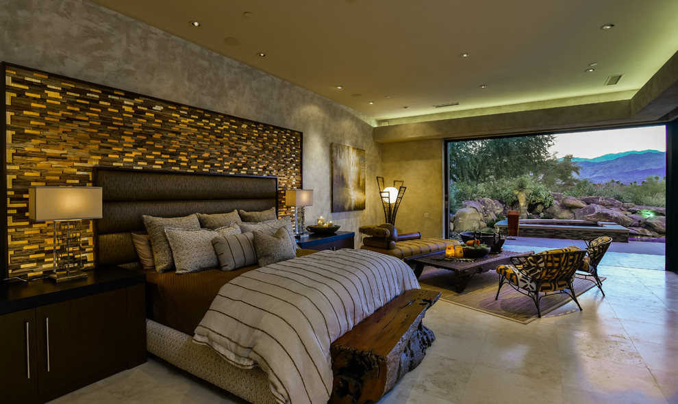 Inspiration for a large contemporary master bedroom in Other with beige walls and travertine floors.