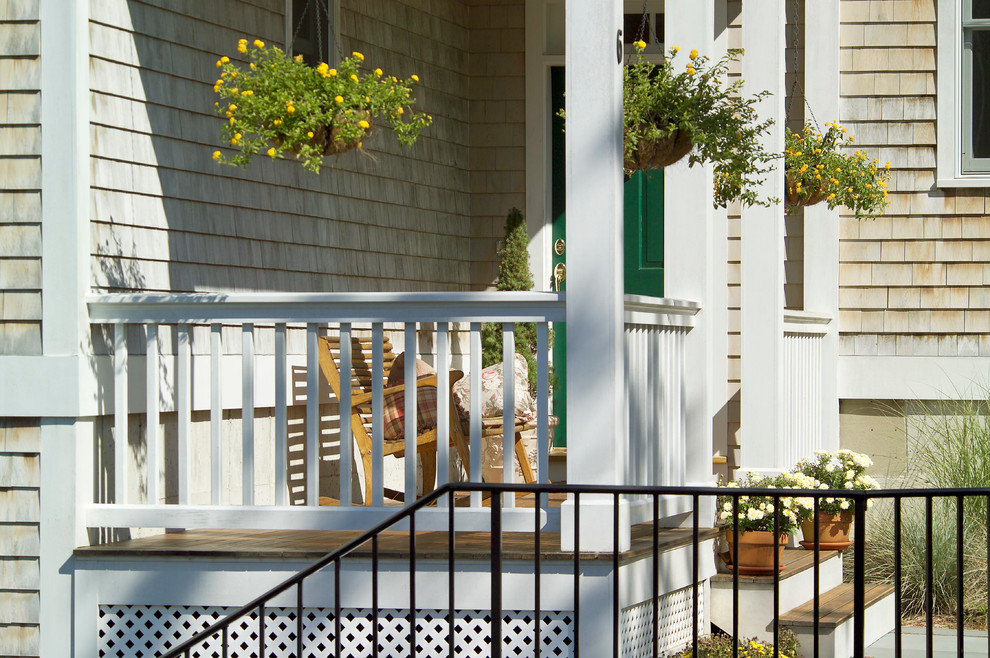 This is an example of a beach style verandah in Boston.