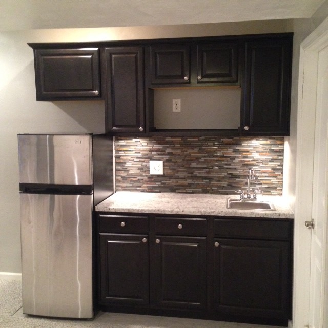 Basement Kitchenette and Corner Fireplace