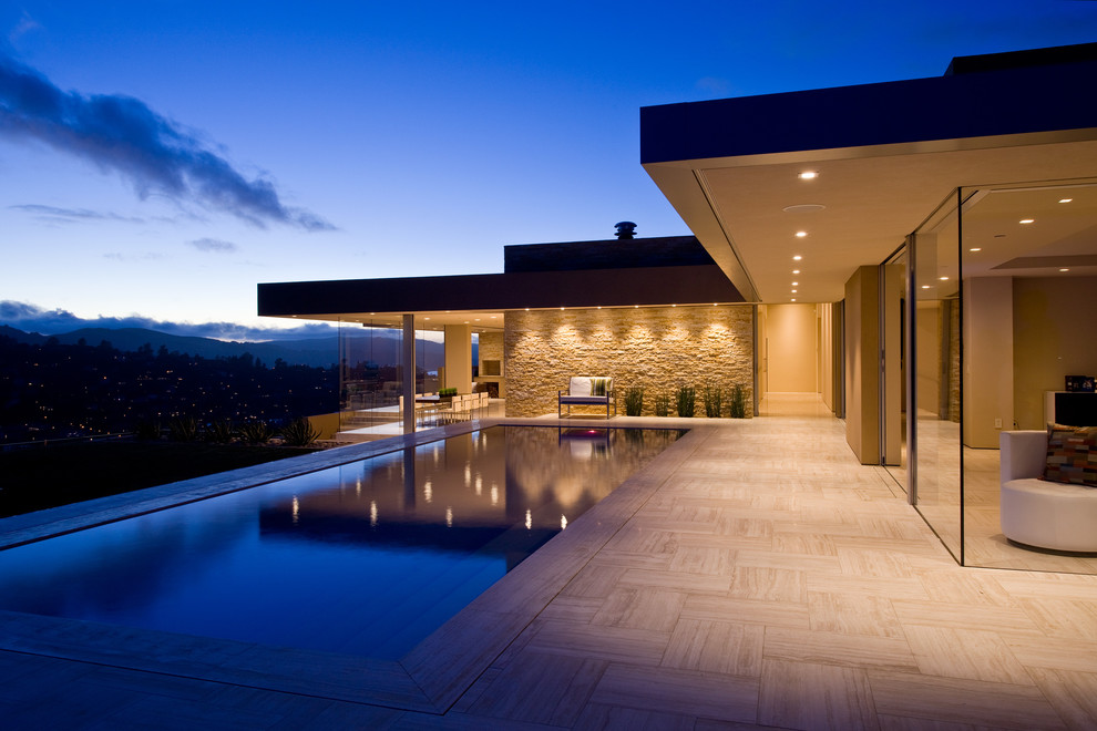 Inspiration for a large modern backyard rectangular pool in San Francisco with tile.