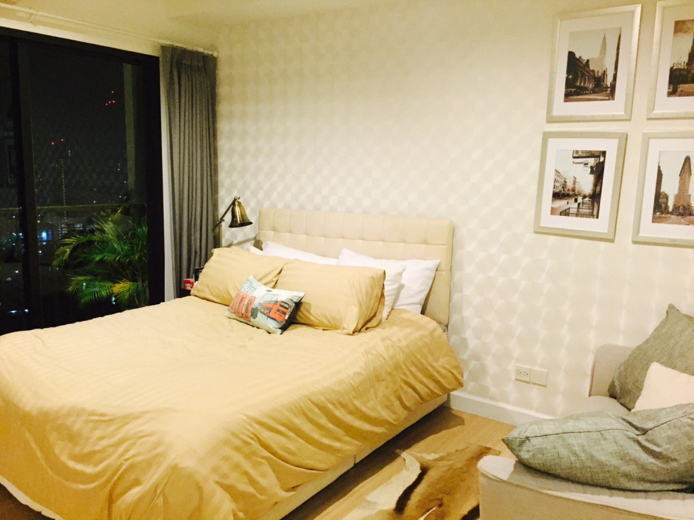 Immagine di una piccola camera da letto contemporanea