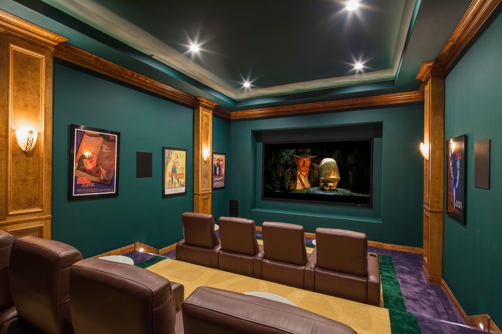 Inspiration for an expansive mediterranean enclosed home theatre in Austin with green walls, carpet and a projector screen.
