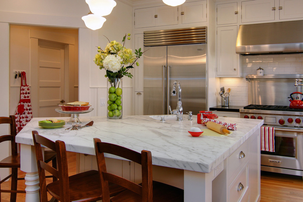 This is an example of a traditional kitchen in San Francisco with stainless steel appliances.
