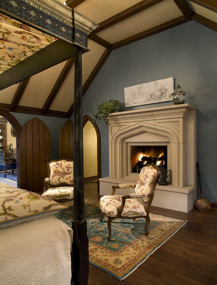 This is an example of a traditional bedroom in Columbus with blue walls.
