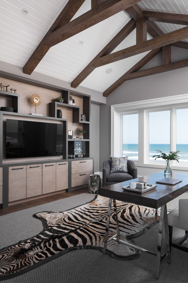 Beach style study room in Jacksonville with grey walls, a freestanding desk, dark hardwood floors and no fireplace.