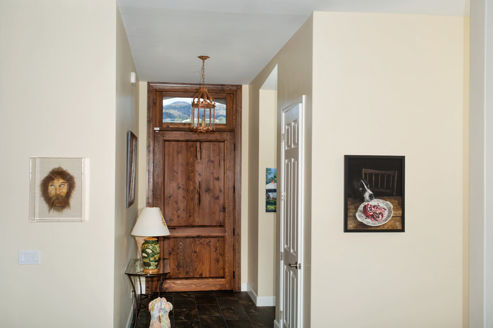 Example of a mid-sized transitional front door design in Phoenix with beige walls and a medium wood front door