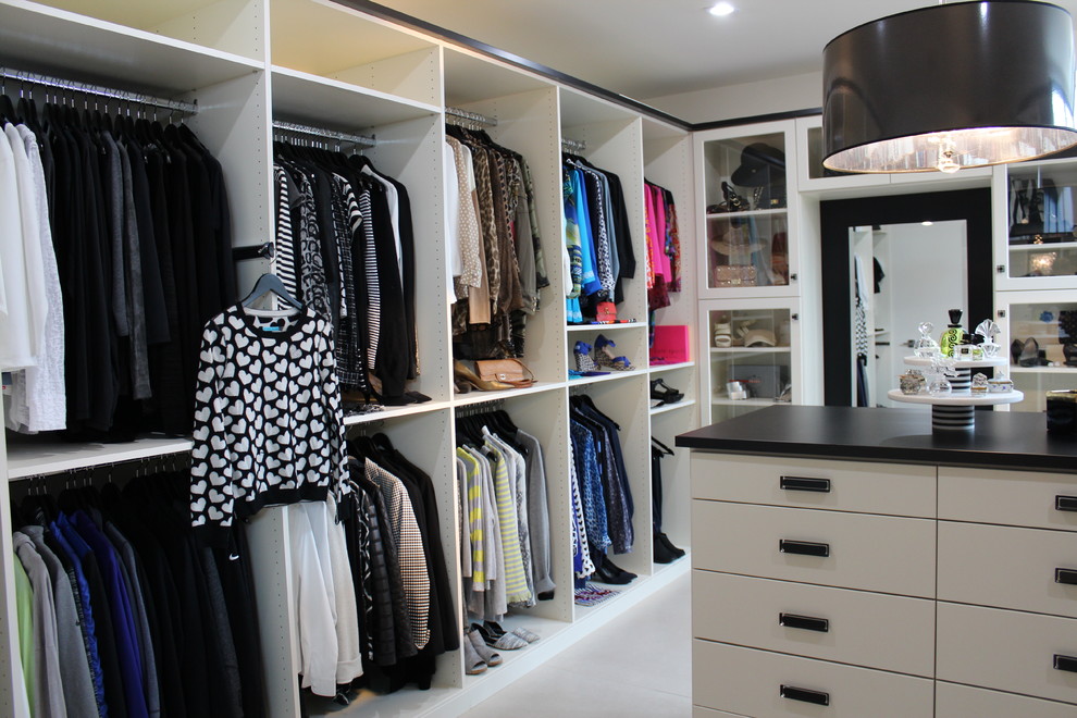 Inspiration for a contemporary storage and wardrobe in Charlotte.