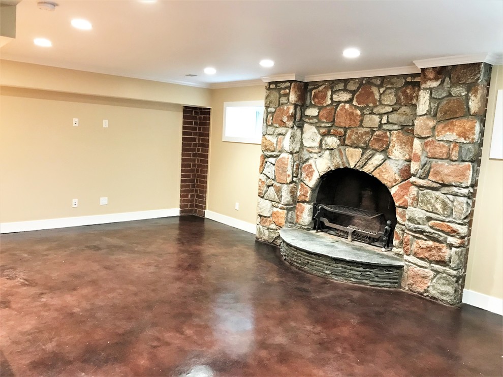 Photo of a country wine cellar in Atlanta with concrete floors and brown floor.