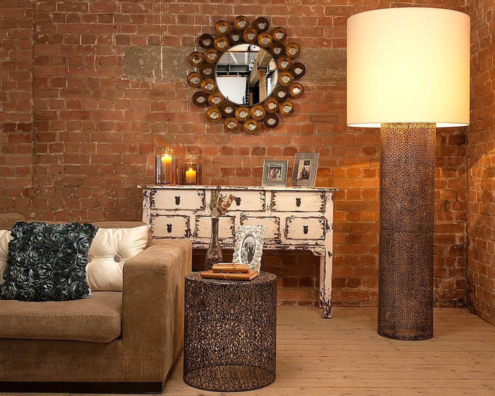 This is an example of a medium sized shabby-chic style open plan living room in London with painted wood flooring.