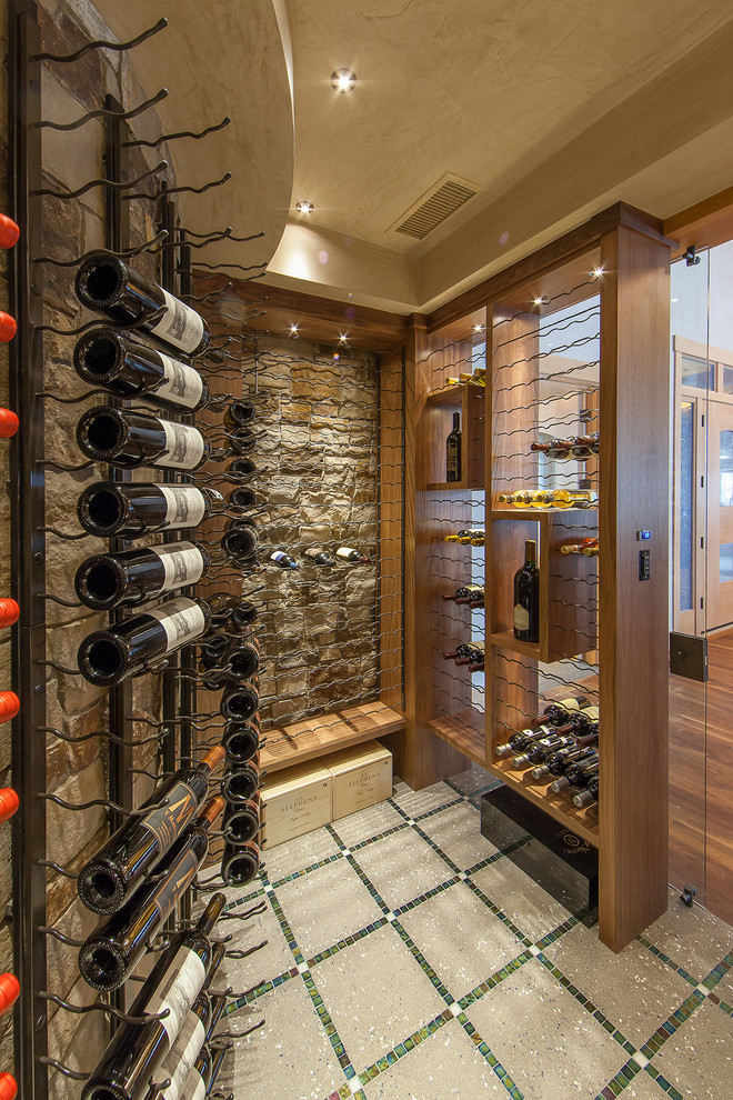 Inspiration for a country wine cellar in Denver with display racks and multi-coloured floor.