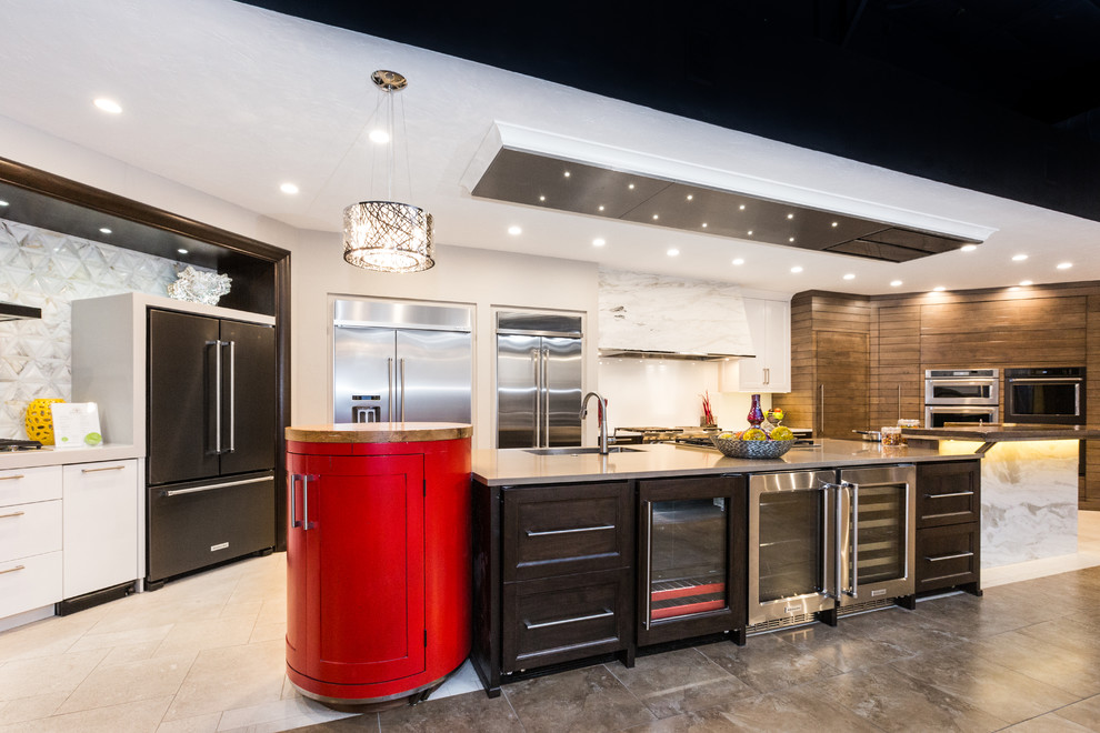 Kitchen - huge transitional limestone floor kitchen idea in Albuquerque with an undermount sink, white backsplash, glass sheet backsplash and an island
