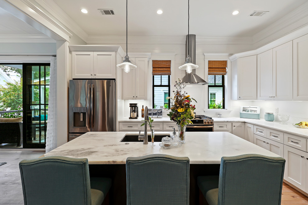 Mid-sized beach style kitchen in Charleston with with island.