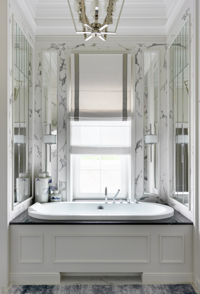 Design ideas for a transitional master bathroom in Other with a drop-in tub and white tile.