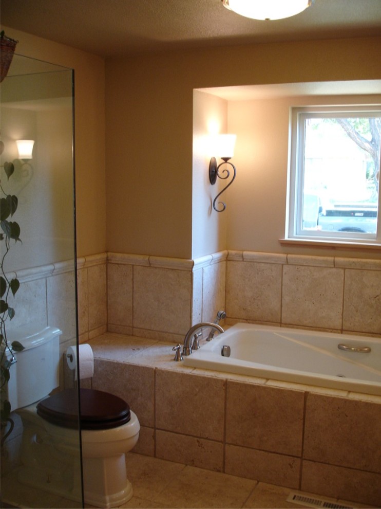 Mid-sized traditional 3/4 bathroom in Denver with a drop-in tub, an alcove shower, a two-piece toilet, beige tile, ceramic tile, beige walls and ceramic floors.