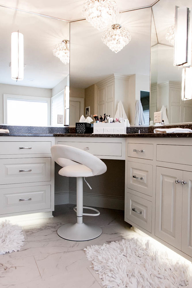 Design ideas for a large transitional master bathroom in Minneapolis with raised-panel cabinets, white cabinets, a hot tub, an alcove shower, a one-piece toilet, white walls, marble floors, an undermount sink and granite benchtops.