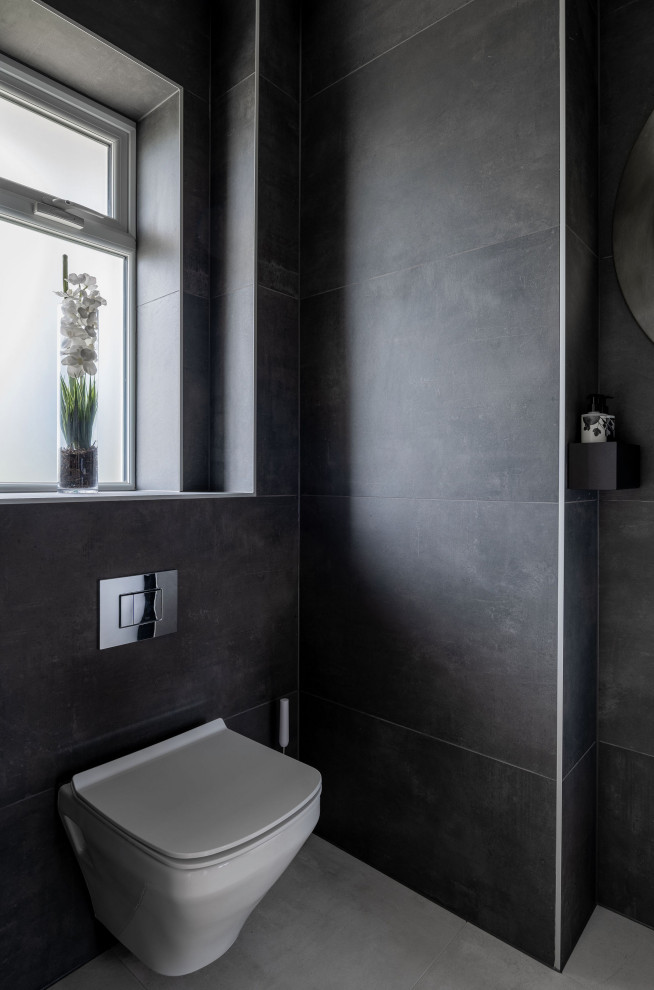 This is an example of a modern powder room in Dorset.