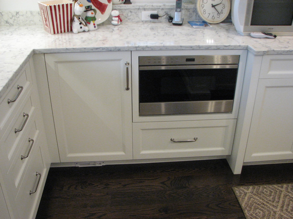 Example of a transitional home design design in Boston