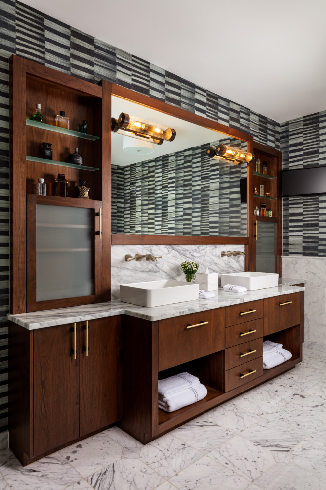 Photo of a contemporary bathroom in Philadelphia with flat-panel cabinets, medium wood cabinets, marble flooring, a vessel sink, marble worktops, white floors, white worktops, double sinks and a built in vanity unit.