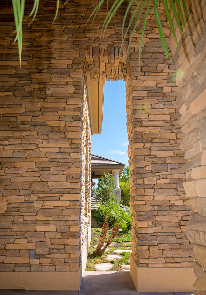 Example of a mountain style home design design in Orange County
