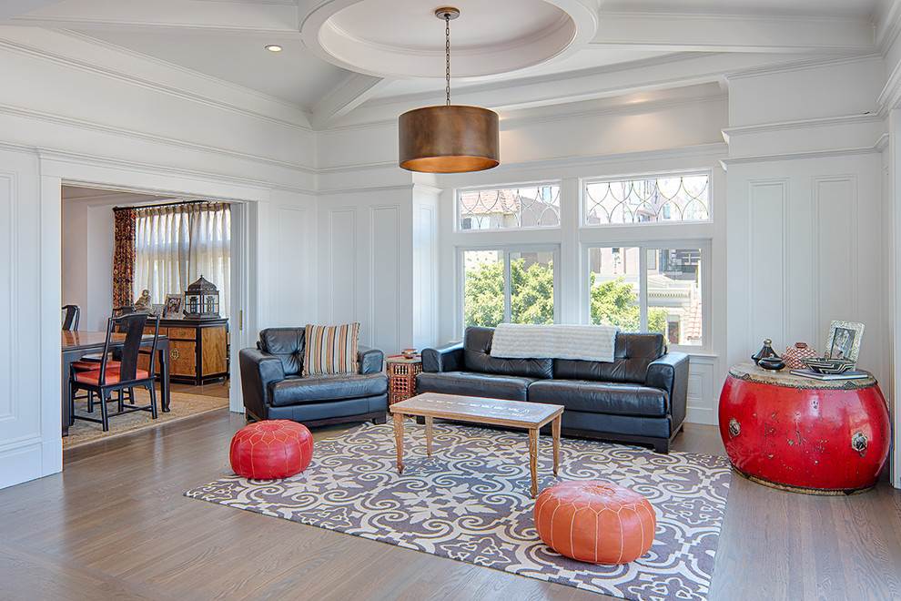 Inspiration for a large contemporary open concept living room in San Francisco with white walls and carpet.