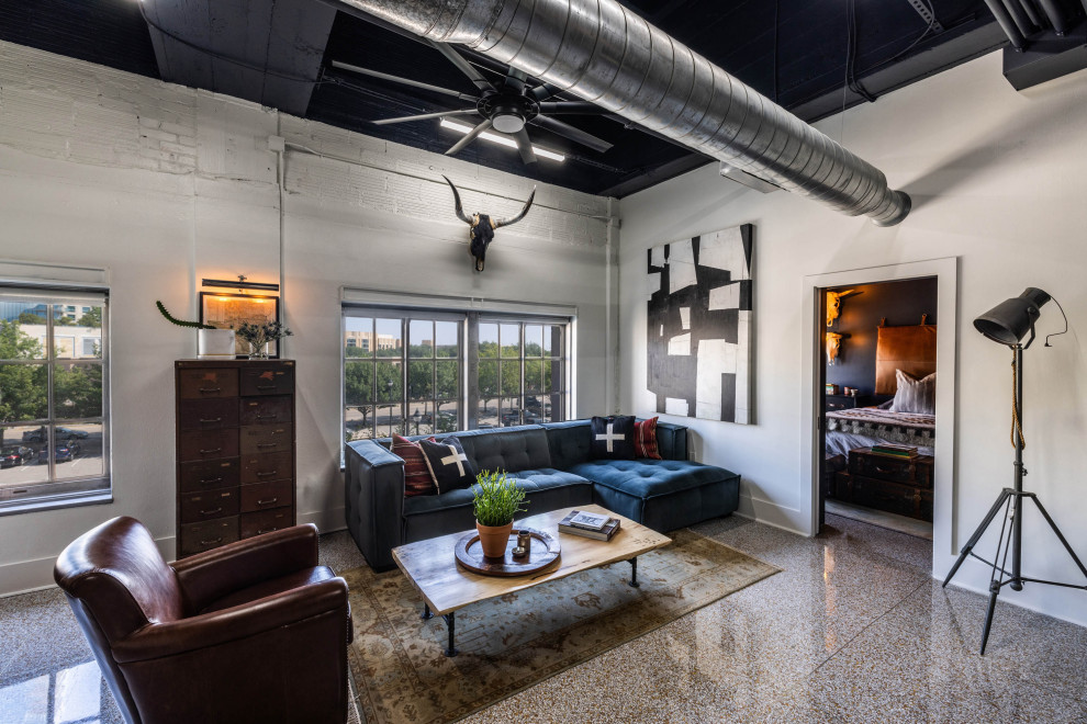 Medium sized industrial open plan living room in Dallas with white walls, a wall mounted tv and multi-coloured floors.