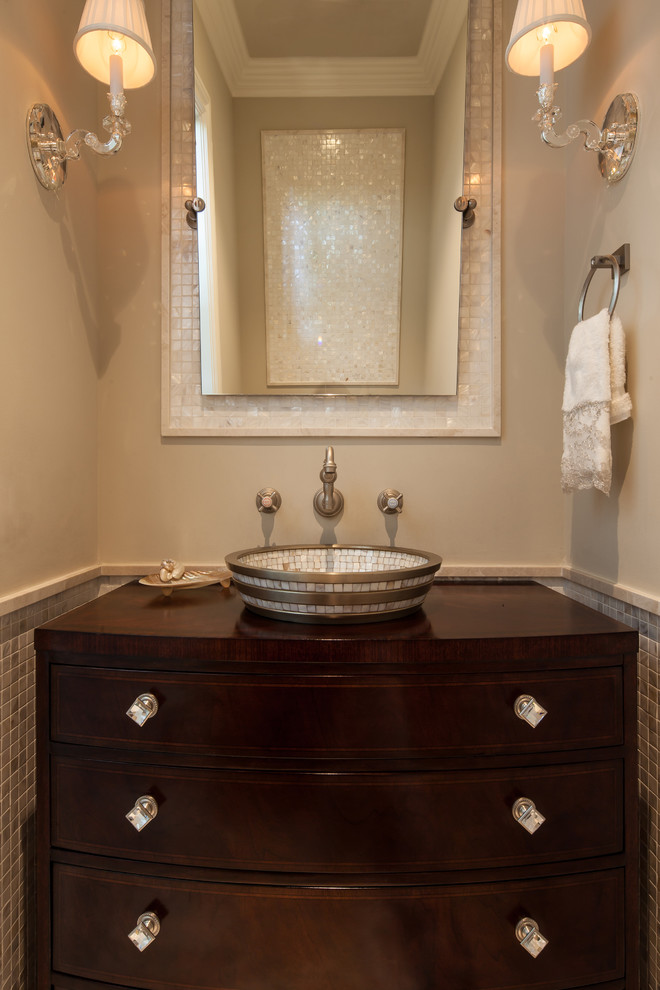 Photo of a mid-sized transitional 3/4 bathroom in Miami with furniture-like cabinets, dark wood cabinets, a one-piece toilet, white tile, mosaic tile, beige walls, marble floors, a vessel sink and wood benchtops.