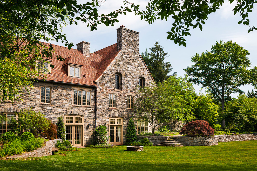 Inspiration for a traditional exterior in Philadelphia with stone veneer.