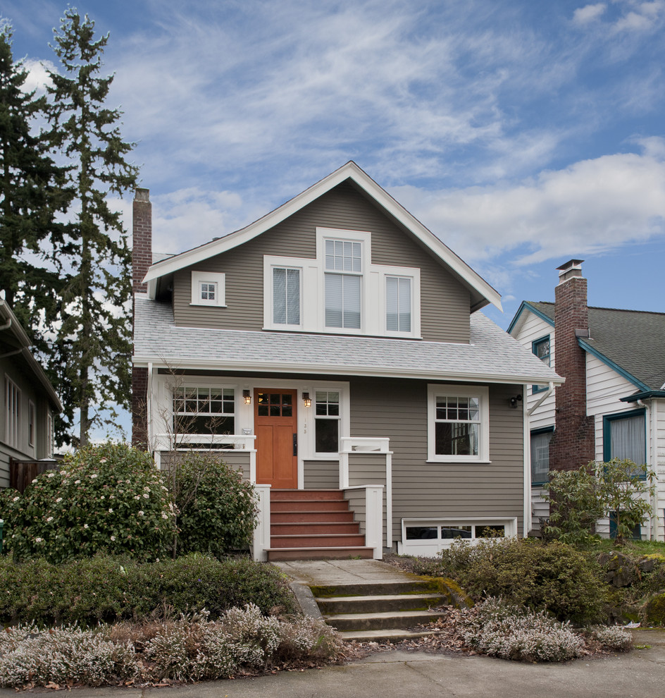 Design ideas for a traditional exterior in Seattle with wood siding.