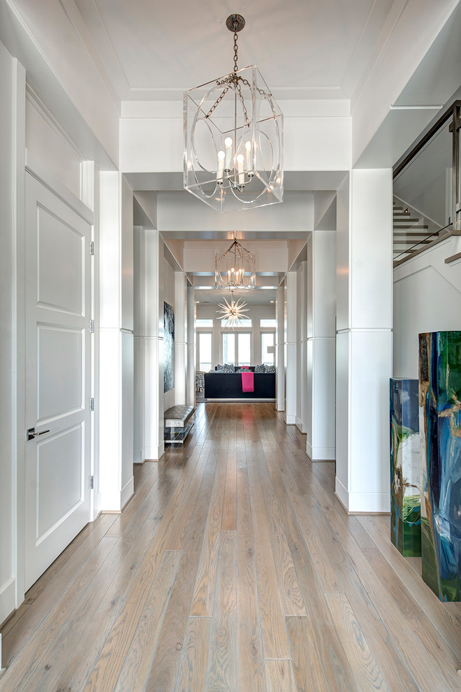 This is an example of a beach style hallway in Houston.