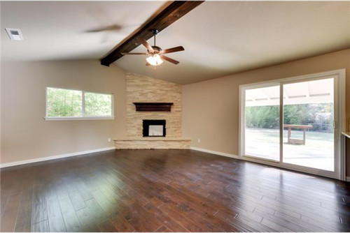Odd Shaped Room in Need of a Rug
