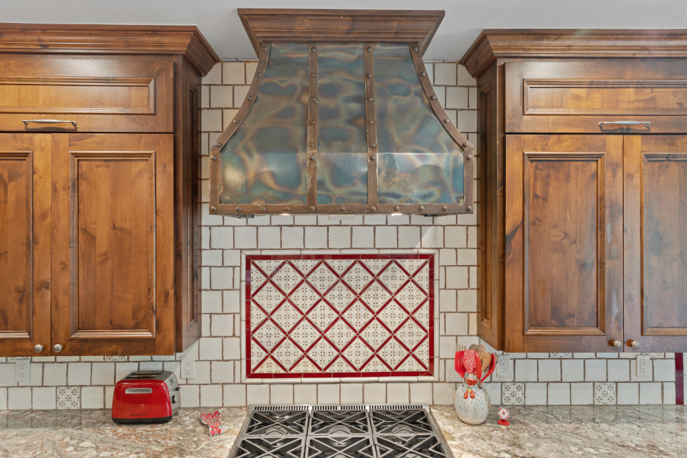 Inspiration for a rustic open concept kitchen remodel with stainless steel appliances
