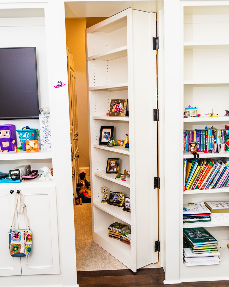 Transitional dark wood floor and brown floor game room photo in New Orleans with white walls, no fireplace and a wall-mounted tv
