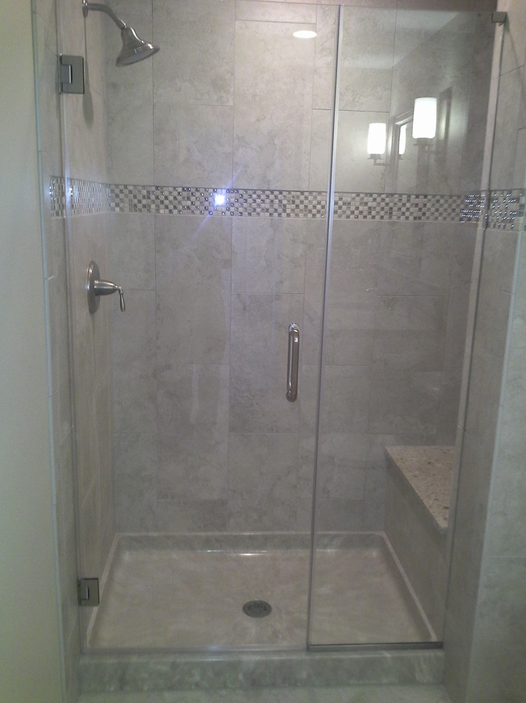 Example of a mid-sized classic 3/4 beige tile and porcelain tile porcelain tile alcove shower design in Philadelphia with flat-panel cabinets, white cabinets, a two-piece toilet and beige walls