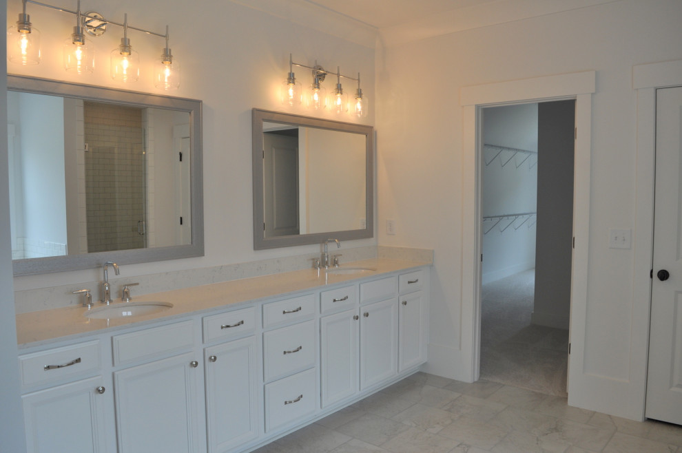 Mid-sized country master bathroom in Atlanta with flat-panel cabinets, white cabinets, white walls, ceramic floors, a drop-in sink, engineered quartz benchtops, grey floor, white benchtops, a double vanity and a built-in vanity.
