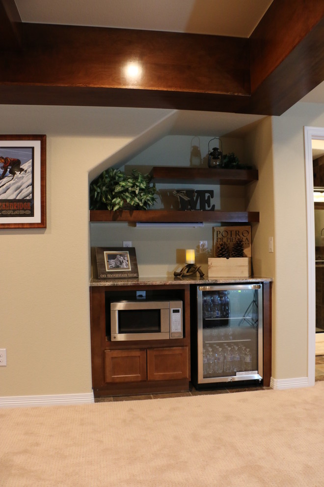Inspiration for a small rustic underground carpeted basement remodel in Denver with beige walls
