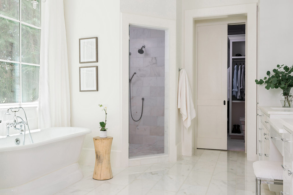 Transitional master bathroom in San Francisco with flat-panel cabinets, white cabinets, a freestanding tub, a corner shower, gray tile, white tile and white walls.