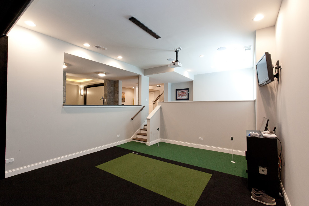Photo of a modern basement in Chicago with white walls.