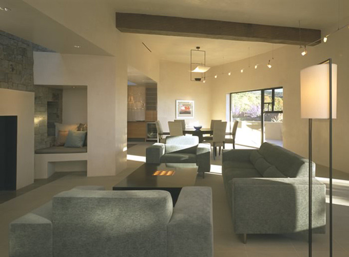 Design ideas for a large modern formal open concept living room in Albuquerque with white walls, ceramic floors, a standard fireplace, a concrete fireplace surround and no tv.