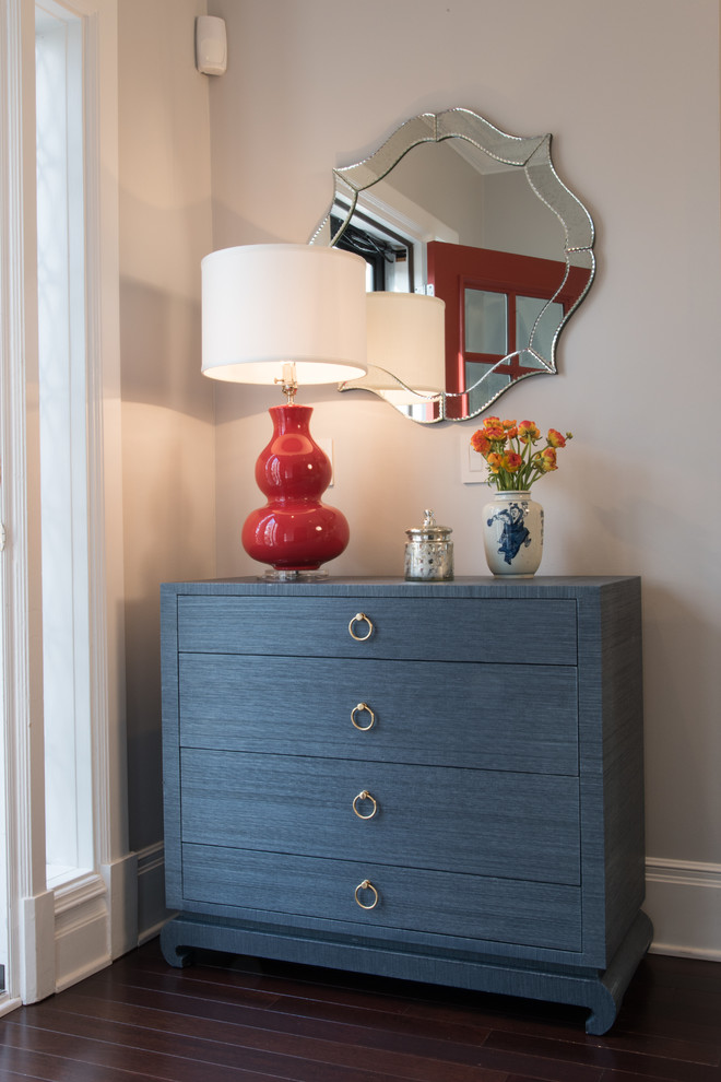 Mid-sized transitional dark wood floor entryway photo in St Louis with beige walls and a white front door