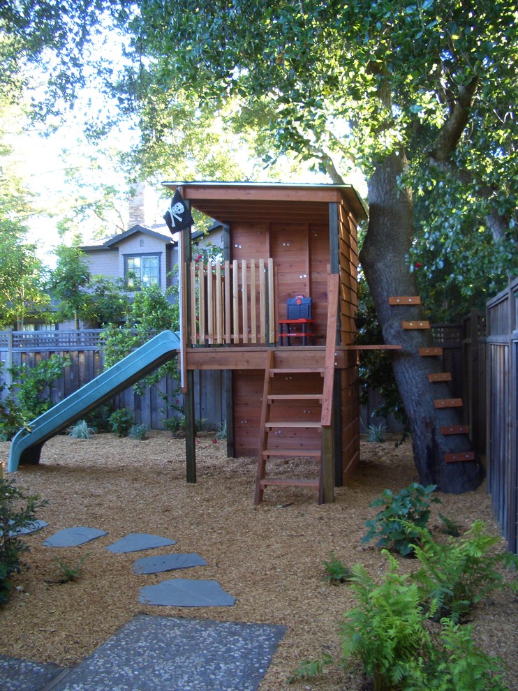 Traditional garden in San Francisco with with outdoor playset.