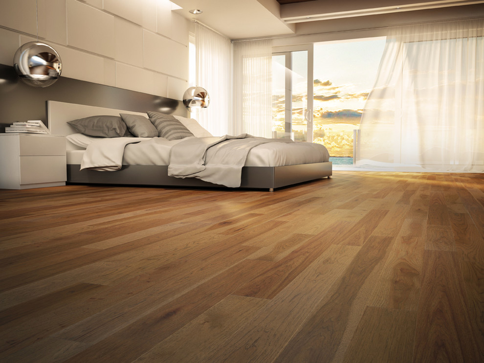 Large beach style master medium tone wood floor and brown floor bedroom photo in Montreal with white walls and no fireplace