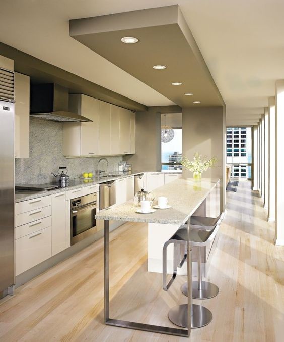 This is an example of a contemporary kitchen in Delhi.