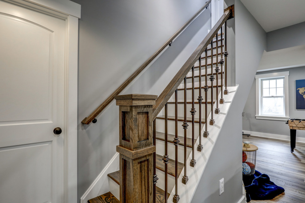 Basement - large transitional walk-out vinyl floor and brown floor basement idea with gray walls