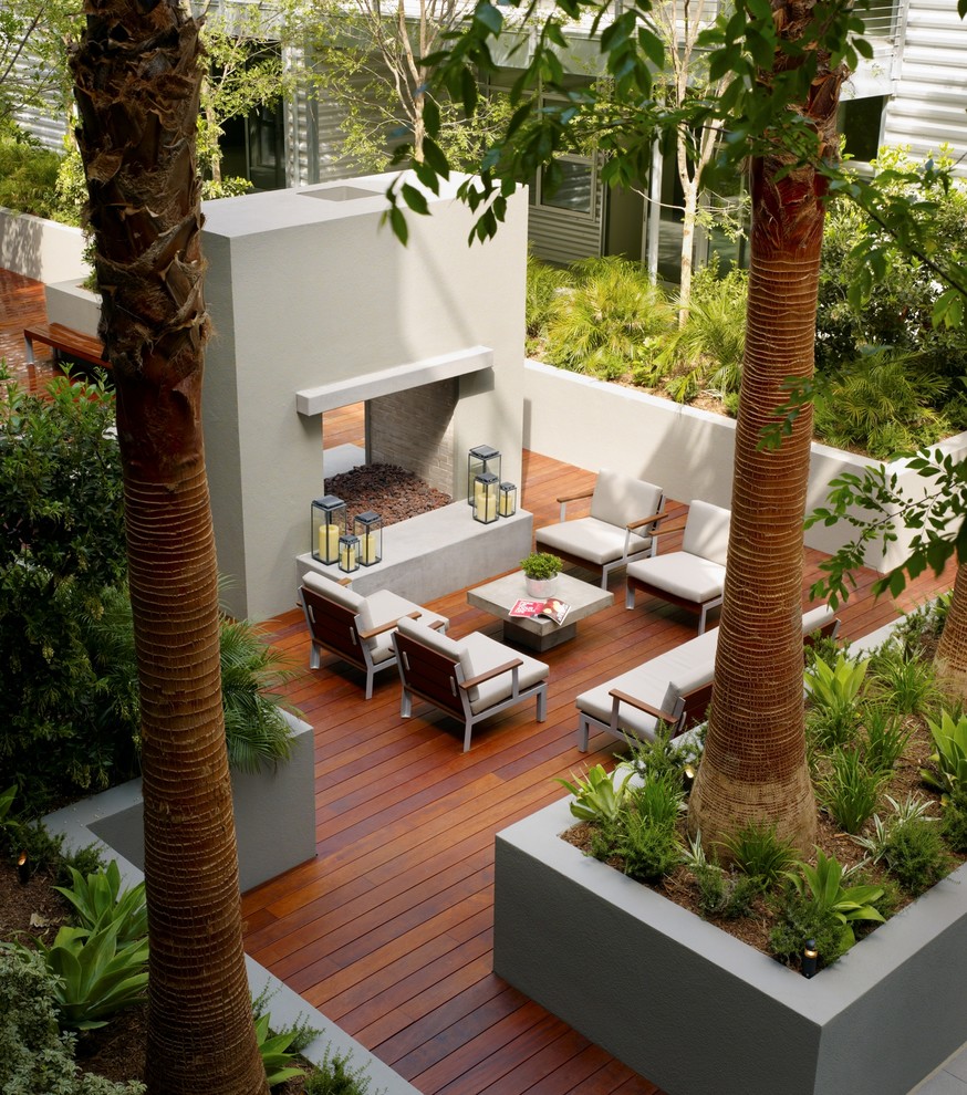 Design ideas for an expansive industrial deck in Los Angeles with no cover.