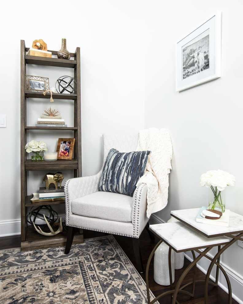 Inspiration for a mid-sized modern freestanding desk dark wood floor and brown floor home office remodel in New York with white walls