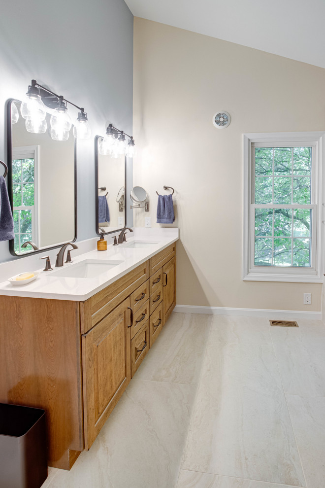 Design ideas for a large transitional master bathroom in DC Metro with raised-panel cabinets, light wood cabinets, a corner shower, an undermount sink, engineered quartz benchtops, a sliding shower screen, a shower seat, a double vanity and a built-in vanity.