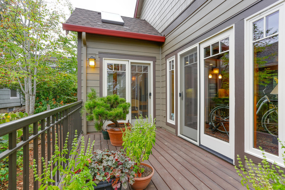 Inspiration for a mid-sized arts and crafts side yard deck in Portland with a container garden and no cover.