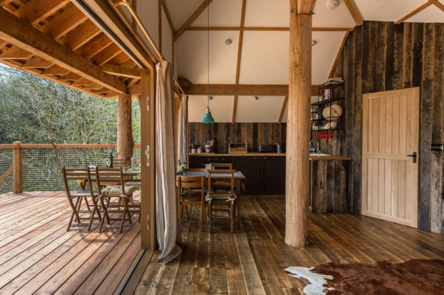 Treehouse Holiday Accommodation at Wolf Woods Devon rustic-deck