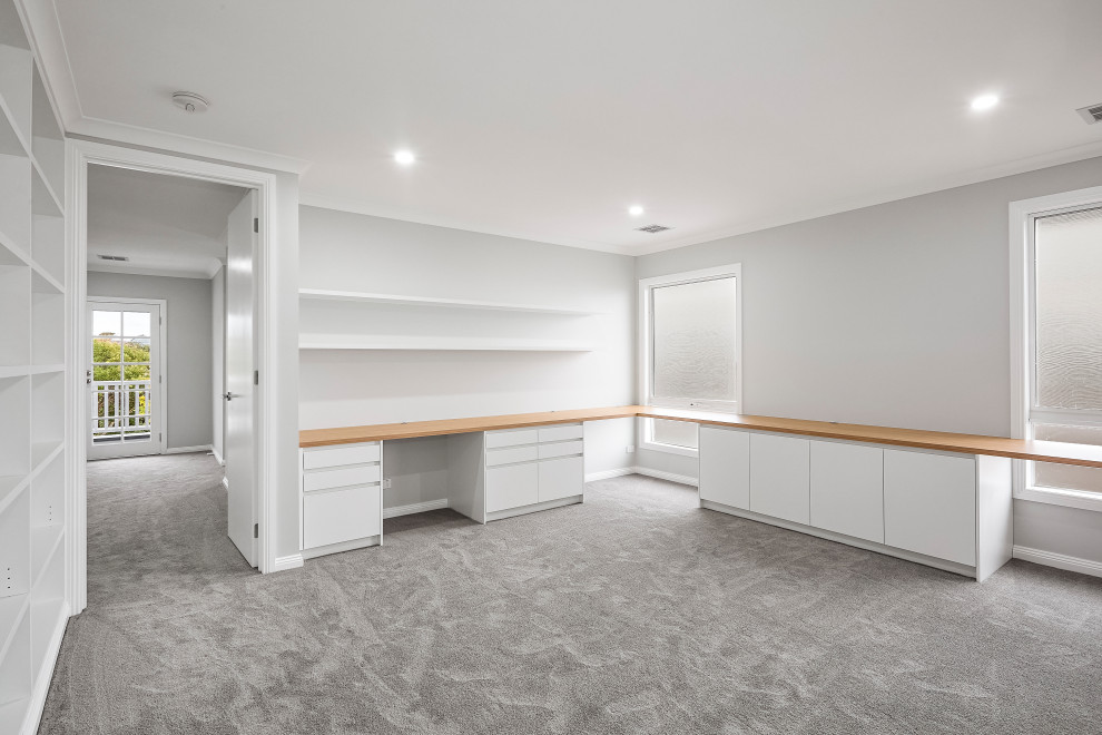 Example of a huge minimalist home design design in Melbourne
